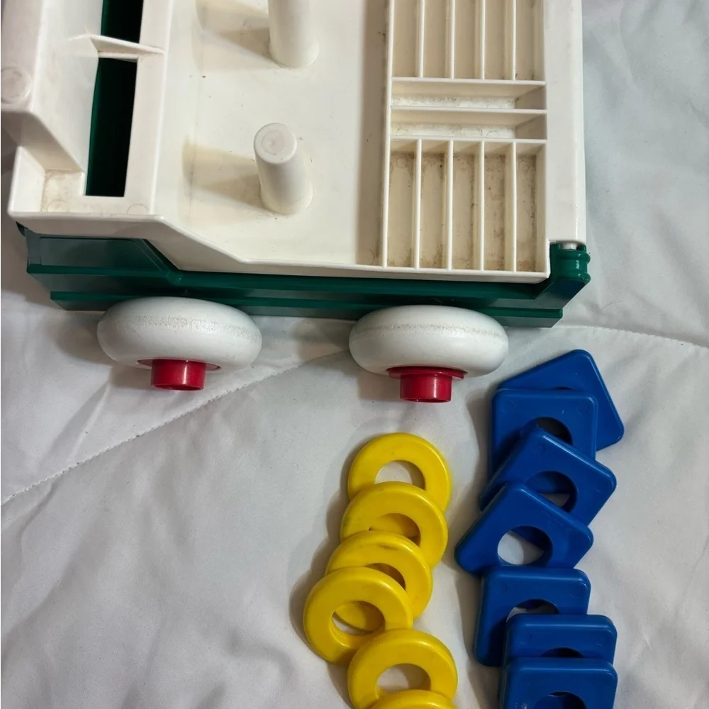 Vintage 1983 Johnson & Johnson Stack And Dump Lift Truck Vehicle with 15 Shapes